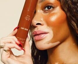 Experience Winnie Harlow's innovative suncare line debut on QVC, catering to all skin tones.